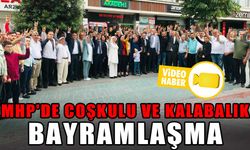 MHP'DE COŞKULU VE KALABALIK BAYRAMLAŞMA