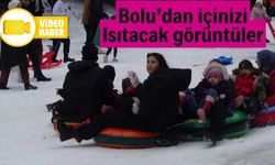 TATİLİ KIZAK VE ŞAMBRELLERLE EĞLENCEYE DÖNÜŞTÜRDÜLER