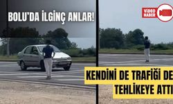 BOLU’DA, AKAN TRAFİĞİN ORTASINDA ÖYLECE DİKİLEN ŞAHIS, GÖRENLERİ ŞAŞIRTTI