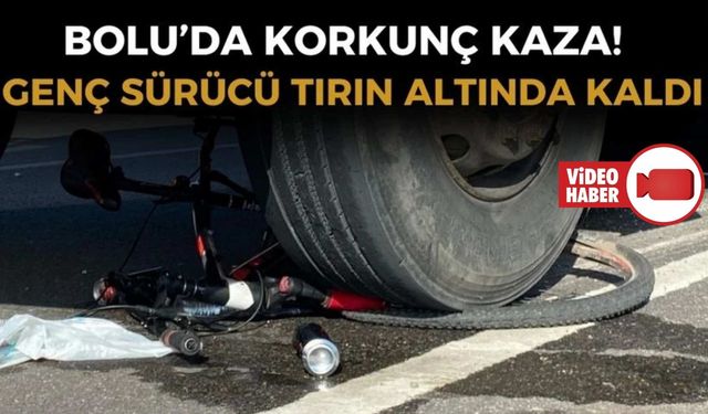 KIRMIZI IŞIKTA GEÇEN BİSİKLETLİ TIRIN ALTINDA KALDI
